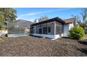 Enclosed pool and patio area, perfect for relaxation at 4907 Parson Brown Ln, Palm Harbor, FL 34684