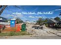 Cleared lot ready for new construction; piles installed at 567 Luzon Ave, Tampa, FL 33606