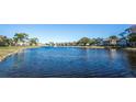 Waterfront view of a community with homes and landscaping at 7001 Interbay Blvd # 336, Tampa, FL 33616