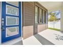 Modern front door with blue paint and glass panels at 1937 W Arch St, Tampa, FL 33607