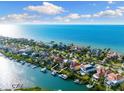 Waterfront property with canal access, boat dock, and neighboring homes at 6301 Marbella Blvd, Apollo Beach, FL 33572