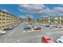 Ample parking lot with designated spaces for residents at 3753 Lake Bayshore Dr # H305, Bradenton, FL 34205