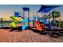 Colorful playground with slides, climbing structures, and shade at 16111 69Th E Ln, Parrish, FL 34219