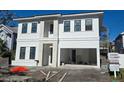 Two-story new construction home with modern facade and attached garage at 3707 W San Juan St, Tampa, FL 33629