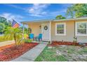 Landscaped front yard with walkway to the front door at 6921 Onyx N Dr, St Petersburg, FL 33702