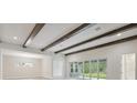 Spacious living room with high ceilings and wood beams at 6257 Hidden Branch Dr, Apollo Beach, FL 33572