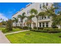 Modern townhome community with lush landscaping at 2442 W Mississippi Ave # 6, Tampa, FL 33629