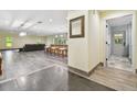 Bright and spacious entryway with wood-look flooring at 28628 Bennington Dr, Wesley Chapel, FL 33544