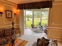 Bright sunroom with view and seating area at 13102 Prestwick Dr, Riverview, FL 33579