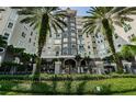 Luxury high-rise building with lush landscaping and gated entrance at 700 S Harbour Island Blvd # 722, Tampa, FL 33602