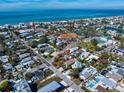 Aerial view showing home's location near beach, and other local amenities at 1401 Bay Palm Blvd, Indian Rocks Beach, FL 33785