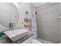 Modern bathroom with updated vanity, shower, and stylish tile at 1334 Fairmont St, Clearwater, FL 33755