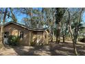 House exterior view with trees at 307 Tweed Ave, Seffner, FL 33584