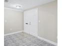 Bright and spacious entryway with tiled flooring at 3600 Landale Dr, Holiday, FL 34691