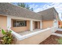 Inviting front porch with a brick-paved walkway at 3600 Landale Dr, Holiday, FL 34691