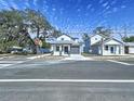 Two story homes on a tree-lined street at 2404 1/2 E Chelsea, Tampa, FL 33610