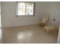 Simple living room with two armchairs and a side table at 3247 Kimberly Oaks Dr, Holiday, FL 34691