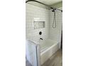 Renovated bathroom with subway tile and modern fixtures at 3616 Alabama Ne Ave, St Petersburg, FL 33703