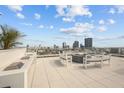 Rooftop terrace showcasing a built-in grill, fire pit, and panoramic city views, perfect for outdoor entertaining at 777 3Rd N Ave # 1504, St Petersburg, FL 33701