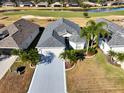 Aerial view of single-story house with golf course views at 10131 Old Tampa Bay Dr, San Antonio, FL 33576