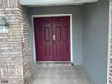 Double door entry with brick facade and tiled flooring at 809 Daphne Dr, Brandon, FL 33510