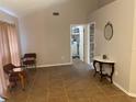 View down hallway with access to laundry and other rooms at 809 Daphne Dr, Brandon, FL 33510