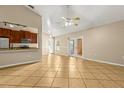 Bright living room with tile floors and an open concept design at 651 Lakemont Dr, Brandon, FL 33510