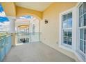 Covered balcony overlooking a residential area at 700 N Osceola Ave # 702, Clearwater, FL 33755