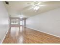 Spacious living room with light walls and wood flooring at 11200 102Nd Ave # 33, Seminole, FL 33778