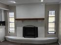 Bright room with a large fireplace as a beautiful focal point at 6969 Oldgate Cir, New Port Richey, FL 34655
