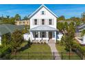 Charming two-story home with a landscaped yard and fenced perimeter at 245 12Th Ne Ave, St Petersburg, FL 33701