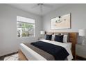 Bright bedroom featuring a neutral color scheme and ample natural light at 819 Tremont Greens Ln, Sun City Center, FL 33573