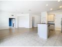 Kitchen with island and light-colored cabinetry at 10918 Ancient Futures Dr, Tampa, FL 33647