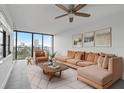 Bright living room with city views and comfortable seating at 500 N Osceola Ave # 802, Clearwater, FL 33755