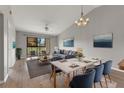 Bright living room with hardwood floors and access to balcony at 1662 Seascape Cir # 205, Tarpon Springs, FL 34689