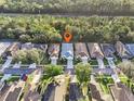 Aerial view showcasing home's location in a quiet residential neighborhood at 5544 Legend Hills Ln, Spring Hill, FL 34609