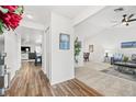 Bright and spacious entryway with wood-look floors leading to living areas at 1300 Cedar Ct, Tarpon Springs, FL 34689