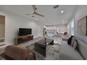 Open living room and kitchen with hardwood floors and modern furniture at 1906 Cherry W St # 2, Tampa, FL 33607