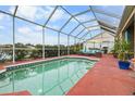 Relaxing screened pool area with patio furniture at 5512 47Th E Ct, Bradenton, FL 34203