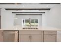 Modern kitchen island with quartz countertop and stainless steel appliances at 12823 Daleridge Pl, Riverview, FL 33579