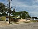 Ranch style home with modern exterior and fenced yard at 304 Patty Dr, Oldsmar, FL 34677