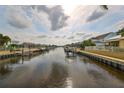 Waterway view with boats and waterfront homes on a sunny day at 618 Islebay Dr, Apollo Beach, FL 33572