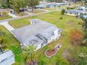 Single story home with a spacious backyard and surrounding landscape at 218 6Th Sw Ave, Ruskin, FL 33570