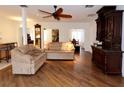 Bright living room featuring hardwood floors and ample seating at 218 6Th Sw Ave, Ruskin, FL 33570