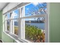 Spacious window offers stunning water views from inside the condo at 7625 Sun Island S Dr # 101, South Pasadena, FL 33707