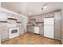 Well-lit kitchen featuring gray cabinetry, modern backsplash, and newer appliances at 6382 81St N Ave, Pinellas Park, FL 33781