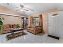 Cozy living room featuring a seating area and access to the front door at 460 48Th S St, St Petersburg, FL 33711