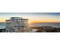 Modern high-rise condo with balconies and panoramic ocean views during sunset at 400 Central Ave # 3909, St Petersburg, FL 33701