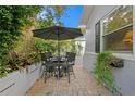 Cozy patio with table and chairs, perfect for outdoor dining at 860 25Th N Ave, St Petersburg, FL 33704