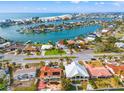 Wide aerial showcasing the location of the house on the waterfront at 10088 Paradise Blvd, Treasure Island, FL 33706